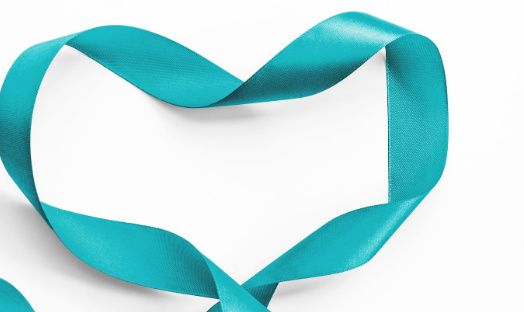 Teal ribbon symbol of sexual assault and PTSD respectively 524 x 312.jpg